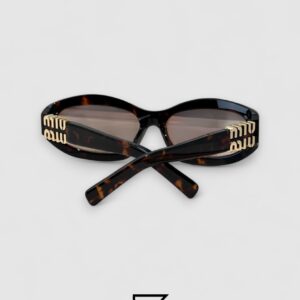 ⁦Miu Miu MU14 141-90H Light Brown Lenses and Tiger Brown Frame With Gold Logo⁩ - الصورة ⁦3⁩
